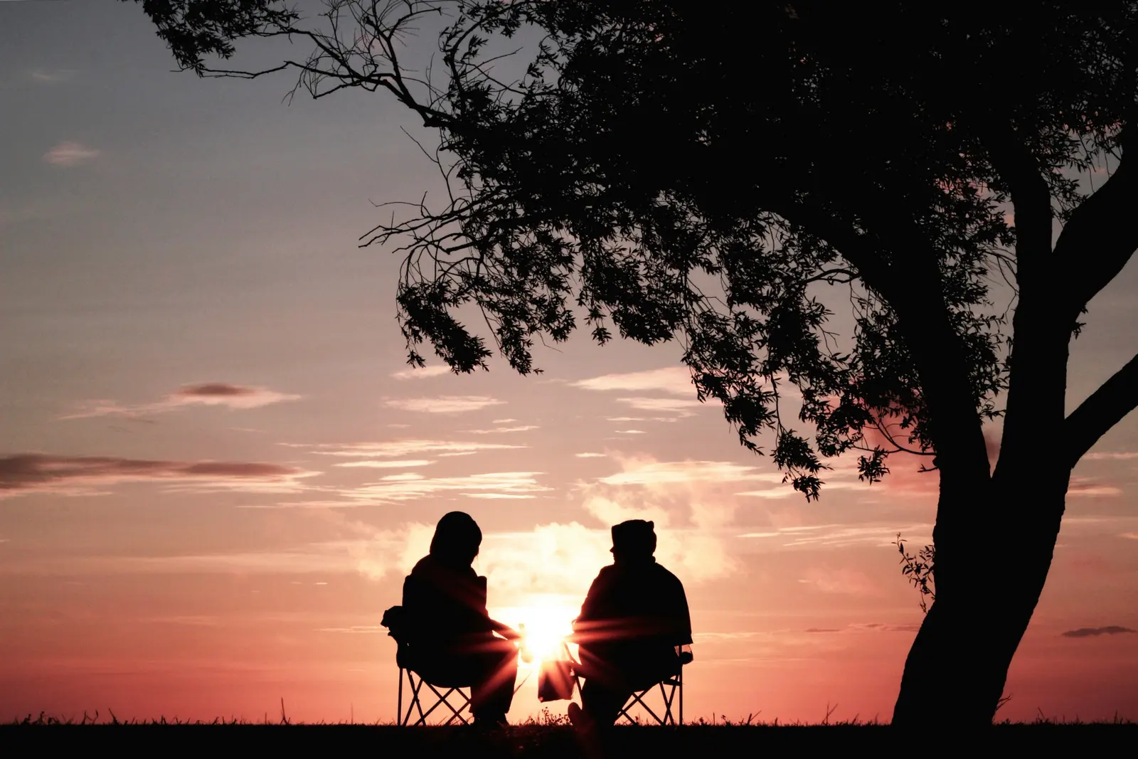 Friends spending time together at sunset
